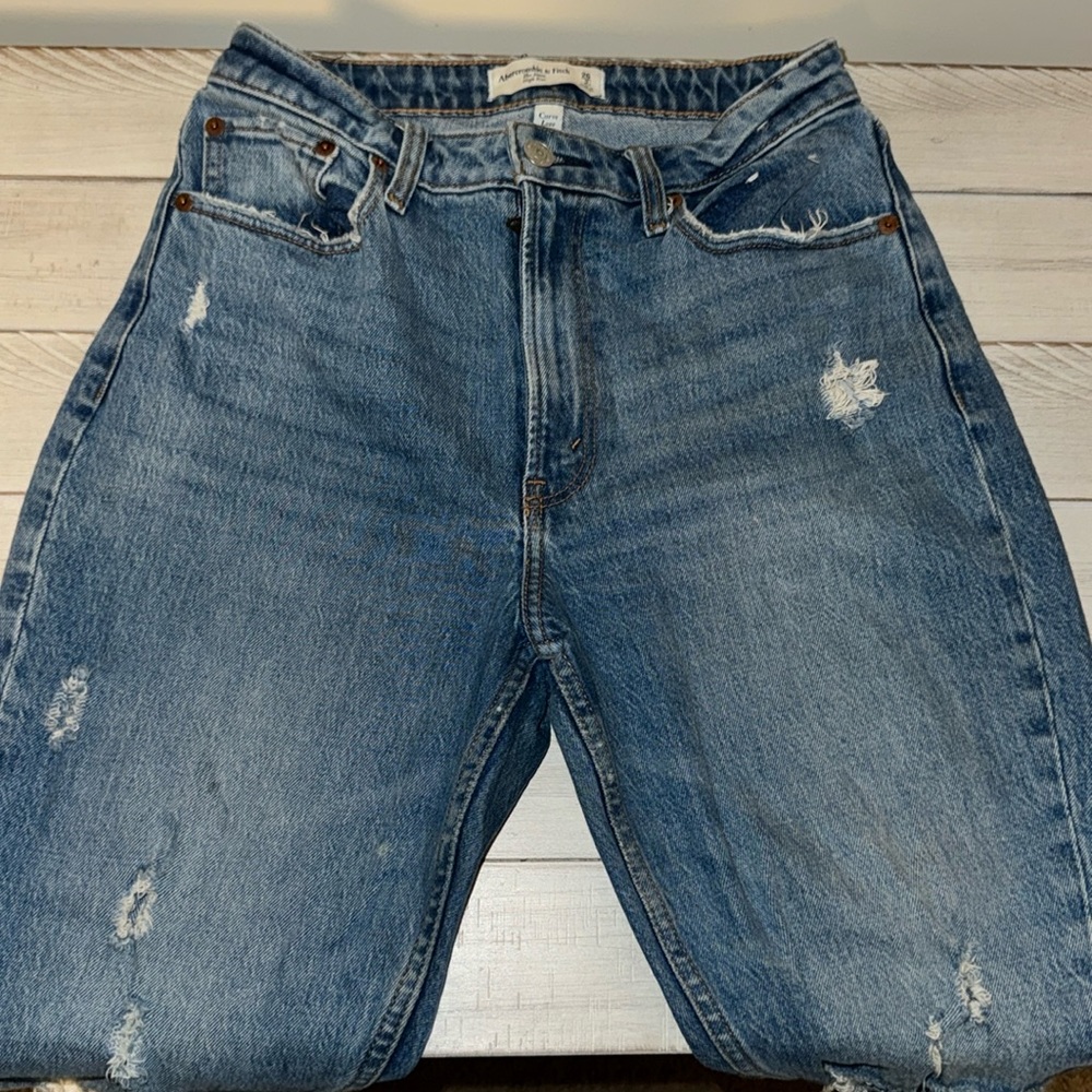 The Mom High Rise Curve Love Jean
